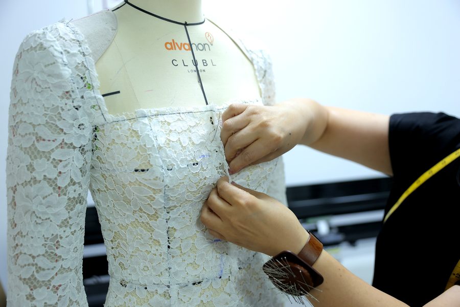 Prototyping a lace dress on a mannequin